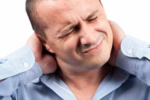 Young businessman with neck pain