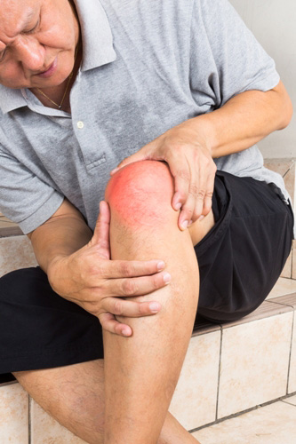 man-suffering-from-painful-knee-joint-Gout-opt